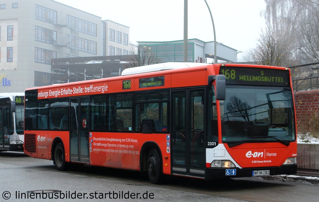 Hochbahn 2301 (HH HN 2301) mit Werbung fr E-on Hanse.
Aufgenommen am ZOB Rahlstedt, 7.12.2010.