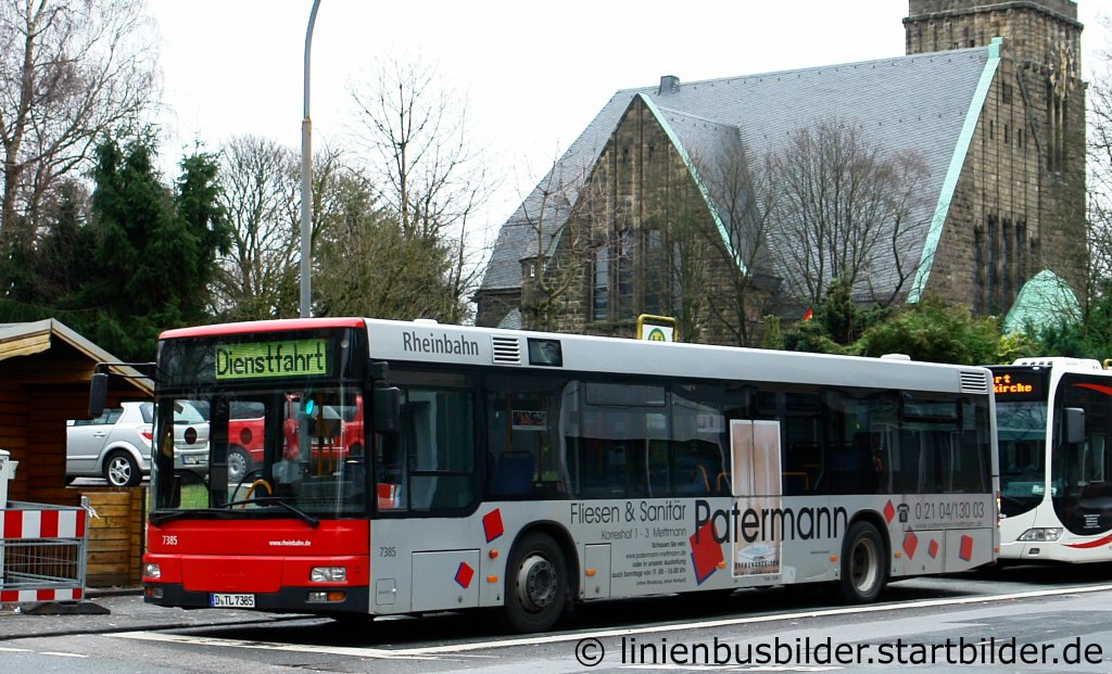 Rheinbahn 7385 (D TL 7385) mit Werbung fr Patermann.
Aufgenommen in Velbert an der Christuskirche am 15.1.2011.