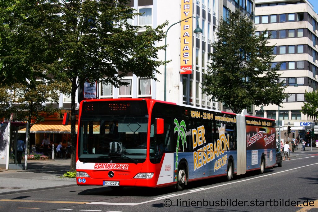 Schloemer (AC HS 1044) mit der Linie 33.
Der Bus wirbt fr den Reisebaron Alsdorf.
Aufgenommen am Luisenbrunnen in Aachen, 17.08.2011.