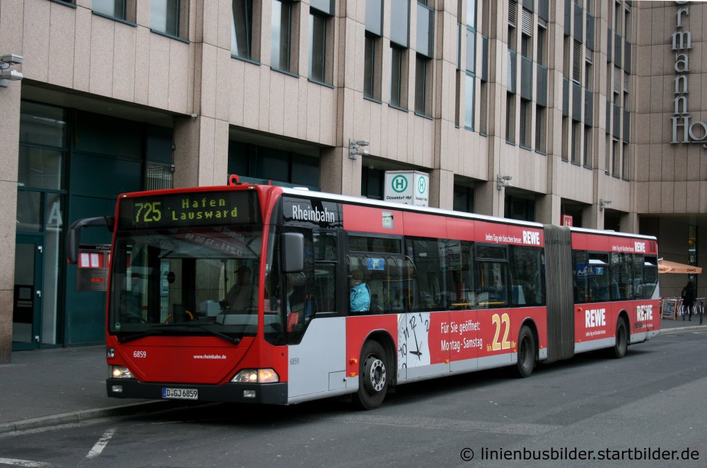 Rheinbahn 6859 (D GJ 6859) mit Werbung fr REWE.
Aufgenommen am HBF Dsseldorf, 13.3.2011.