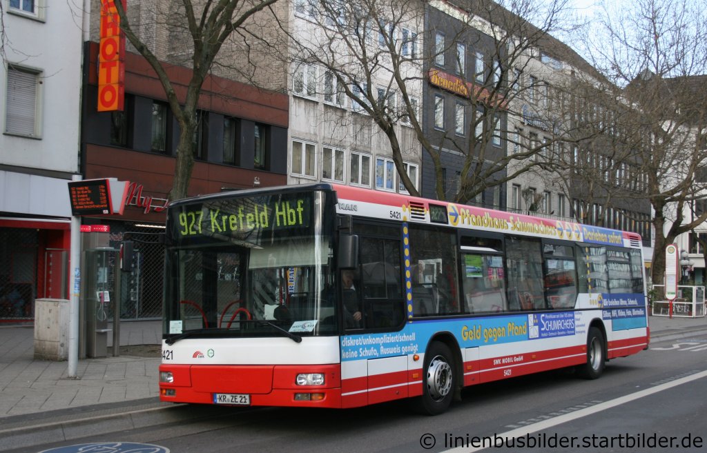 SWK 5421 mit Werbung fr das Pfandhaus Schumscher.
Aufgenommen an der Rheinstrasse in Krefeld am 6.3.2011.